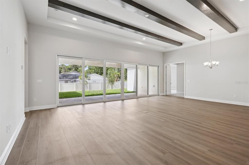 Chandelier, Empty room, Interior, Recessed Lighting, Wooden Beams, Wood Texture Flooring