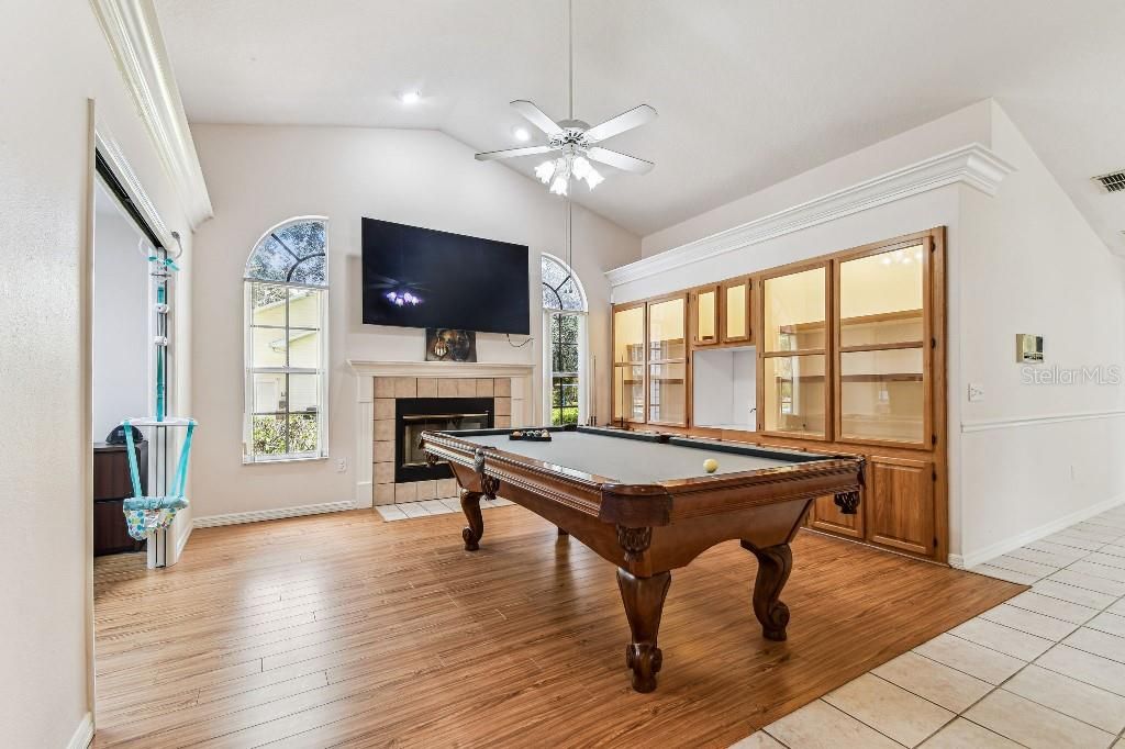 Billiard Table, Fireplace, Game Room, Interior, Recessed Lighting, Wood Texture Flooring
