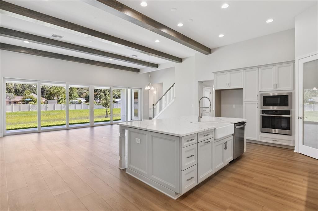 Interior, Kitchen, Pendant Lights, Recessed Lighting, Stainless Steel Appliances, Wooden Beams, Wood Texture Flooring