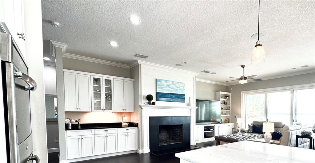 Fireplace, Interior, Kitchen, Pendant Lights, Recessed Lighting, Wood Texture Flooring