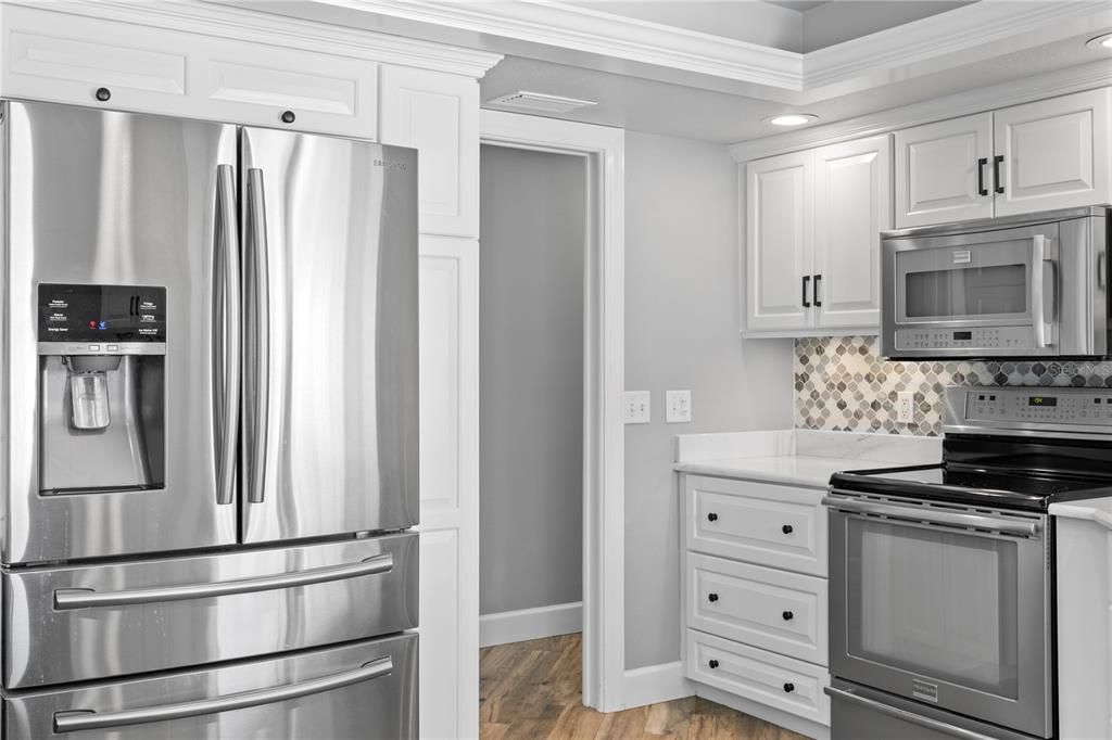 Interior, Kitchen, Recessed Lighting, Stainless Steel Appliances, Wood Texture Flooring