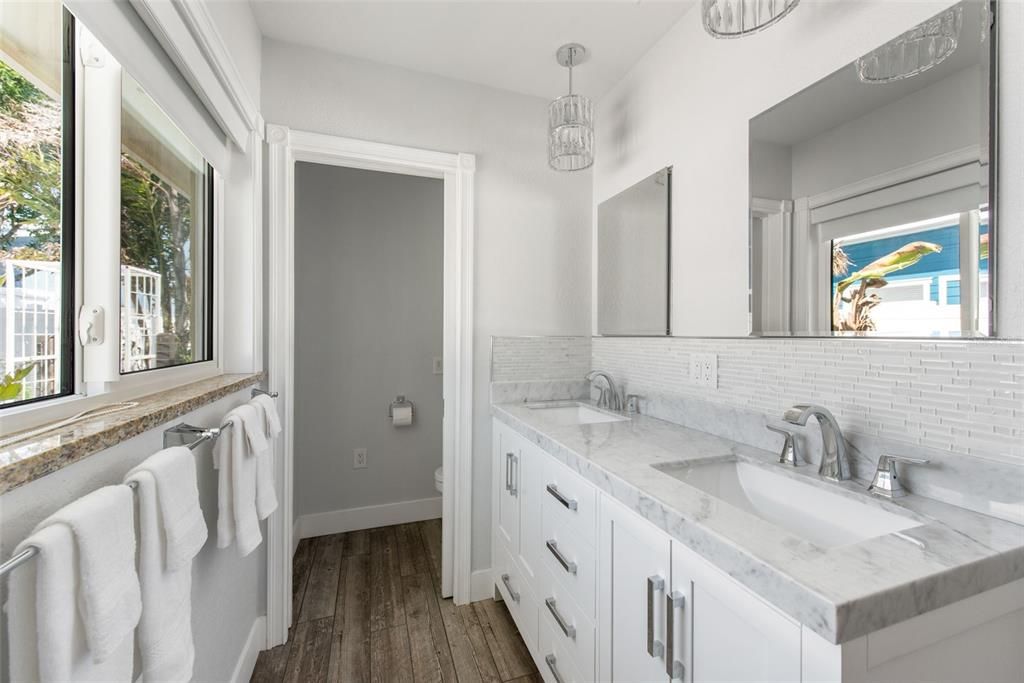 Bathroom, Dual Sink Vanities, Interior, Pendant Lights, Wood Texture Flooring