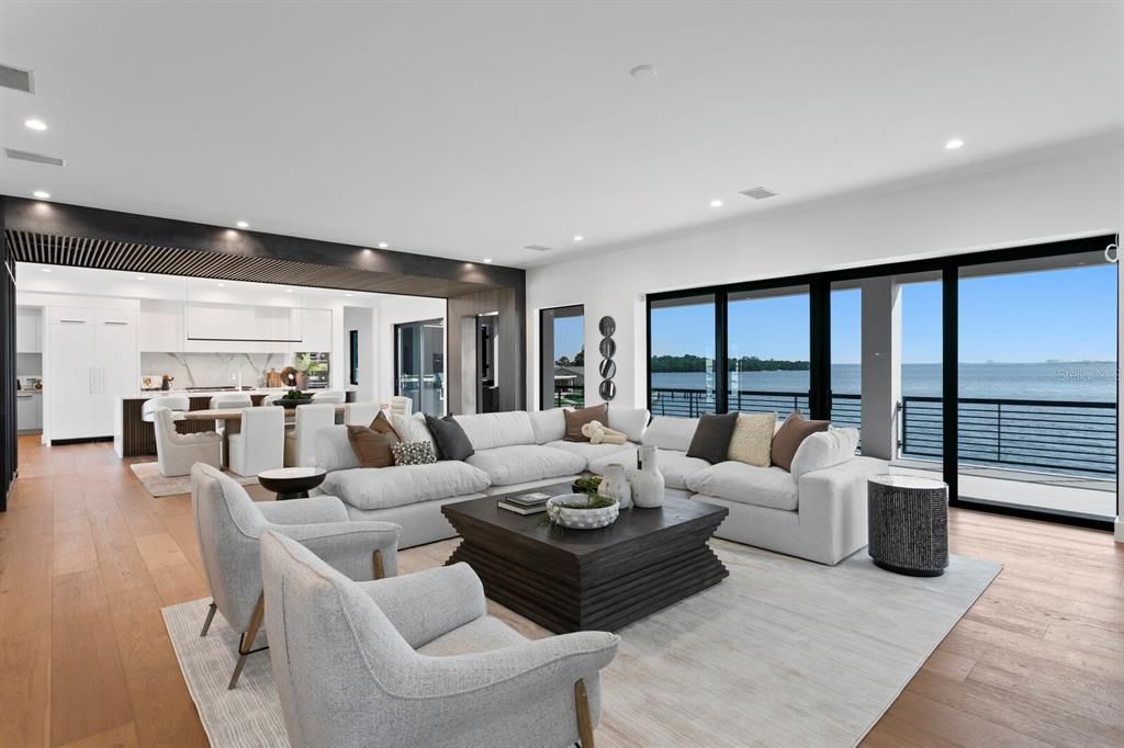 Dining room, Interior, Kitchen, Living room, Recessed Lighting, Water, Wood Texture Flooring