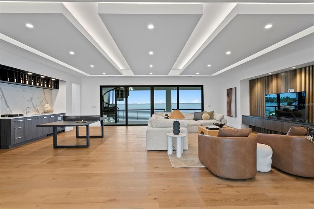 Game Room, Interior, Living room, Marble Walls, Recessed Lighting, Water, Wood Texture Flooring