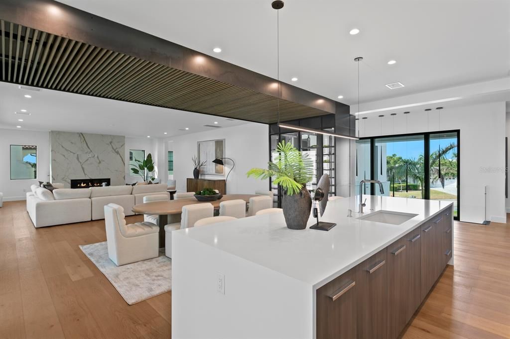 Dining room, Fireplace, Interior, Kitchen, Living room, Pendant Lights, Recessed Lighting, Wood Texture Flooring