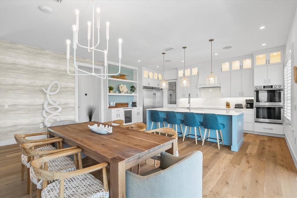 Dining room, Interior, Kitchen, Pendant Lights, Recessed Lighting, Stainless Steel Appliances, Wood Texture Flooring