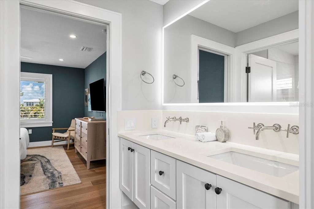 Bathroom, Dual Sink Vanities, Interior, Recessed Lighting, Wood Texture Flooring
