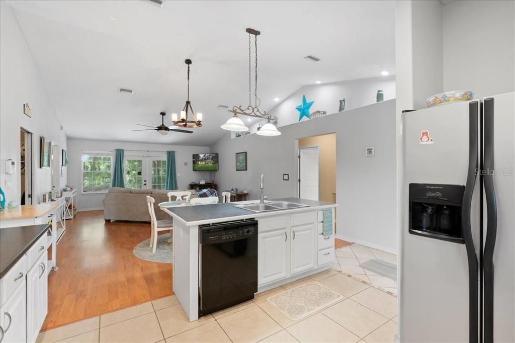 Dining room, Interior, Kitchen, Living room, Pendant Lights, Recessed Lighting, Wood Texture Flooring
