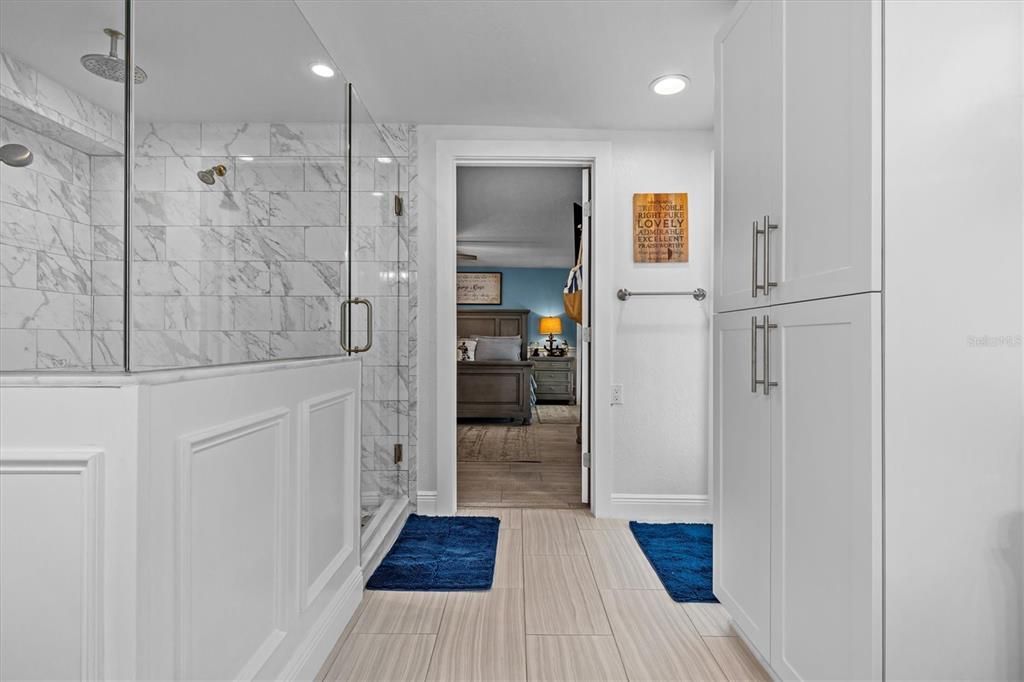 Bathroom, Bedroom, Glass Shower, Interior, Marble Walls, Recessed Lighting, Wood Texture Flooring
