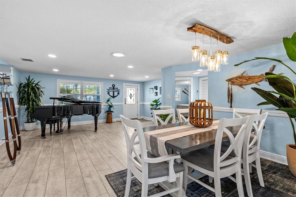 Dining room, Interior, Pendant Lights, Piano, Recessed Lighting, Wood Texture Flooring