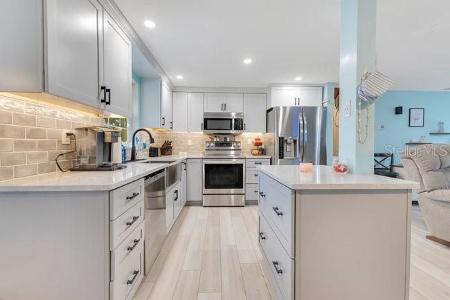 Interior, Kitchen, Recessed Lighting, Stainless Steel Appliances, Wood Texture Flooring