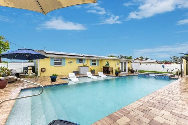 Exterior, Pool, Solar Panels