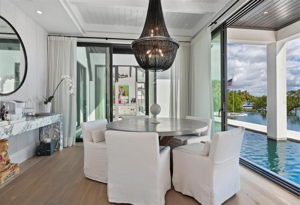 Dining room, Fireplace, Interior, Recessed Lighting, Water, Wood Texture Flooring