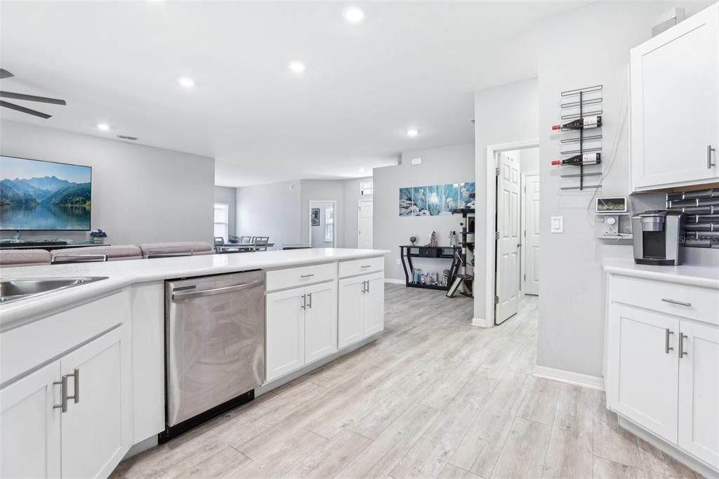 Dining room, Interior, Kitchen, Recessed Lighting, Stainless Steel Appliances, Wood Texture Flooring