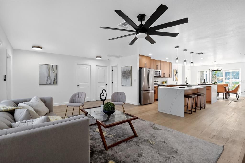 Dining room, Interior, Kitchen, Living room, Pendant Lights, Recessed Lighting, Stainless Steel Appliances, Wood Texture Flooring