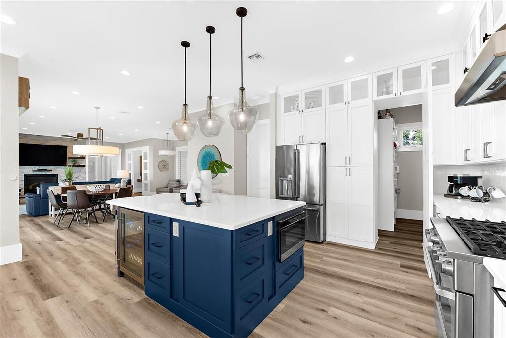 Dining room, Interior, Kitchen, Pendant Lights, Recessed Lighting, Stainless Steel Appliances, Wood Texture Flooring
