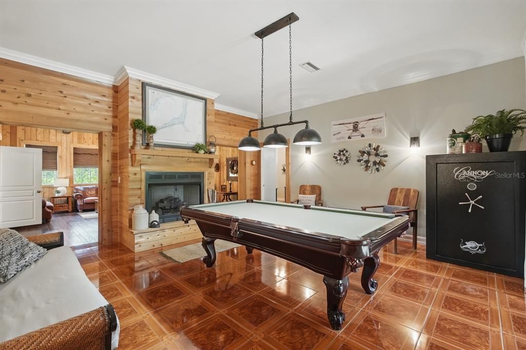 Billiard Table, Fireplace, Game Room, Interior, Pendant Lights, Wood Texture Flooring, Wooden Walls