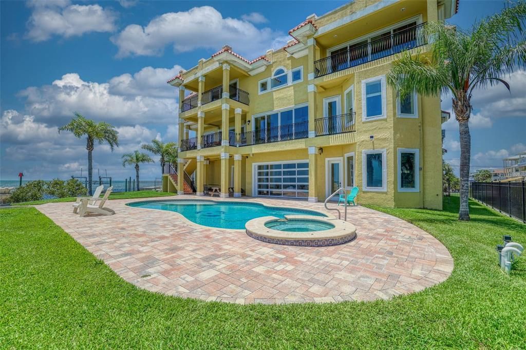 Attached, Backyard, Exterior, Facade, Pool, Condo Building