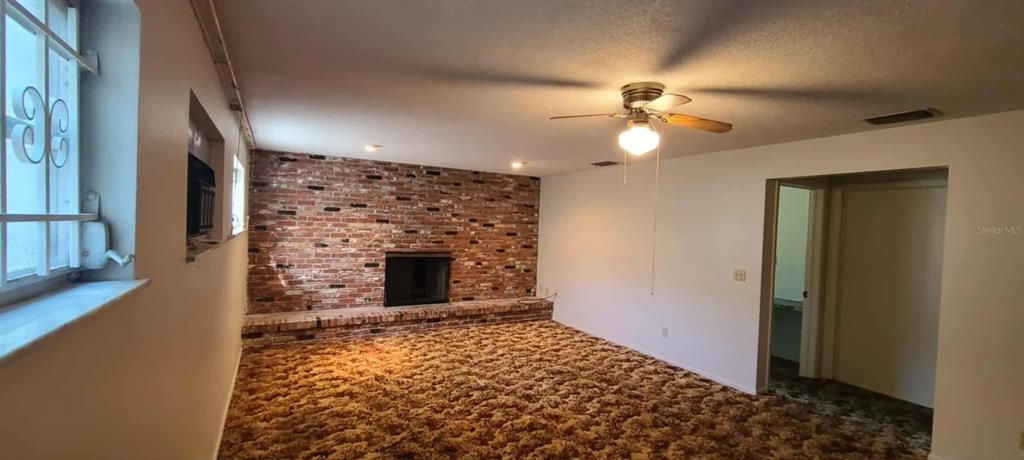Empty room, Fireplace, Interior, Recessed Lighting, Stone Walls