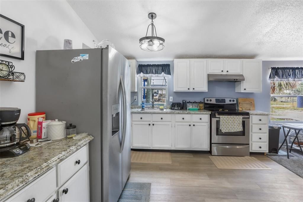 Interior, Kitchen, Pendant Lights, Stainless Steel Appliances, Wood Texture Flooring