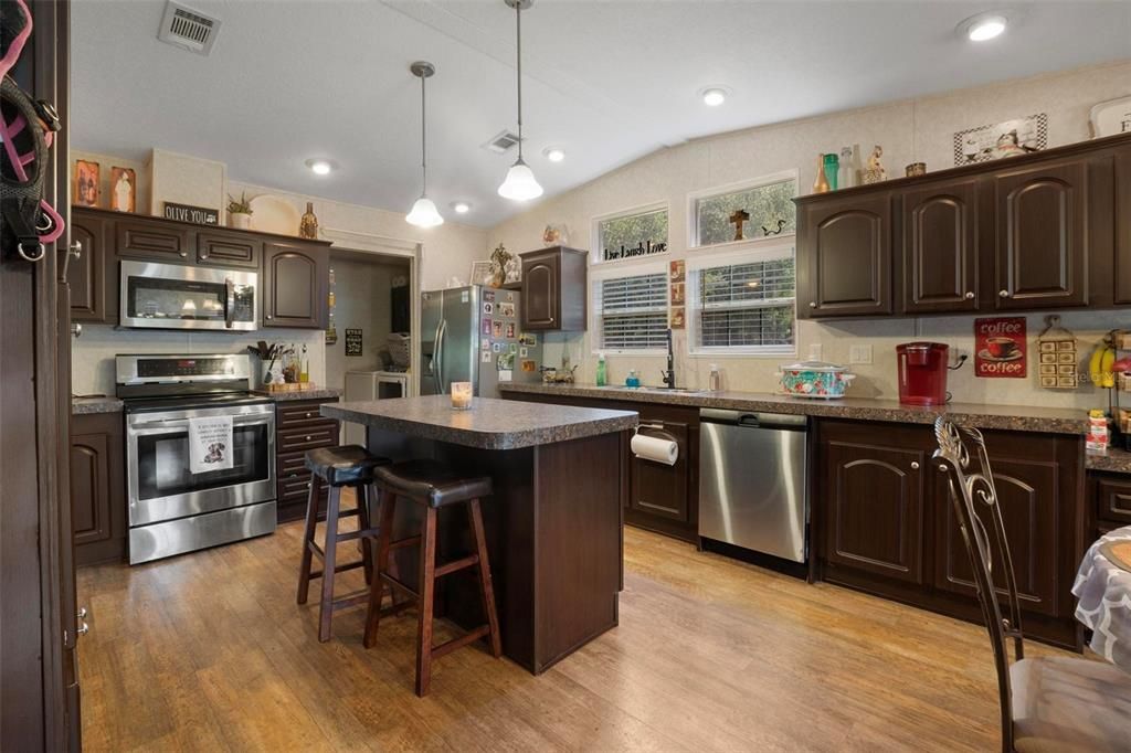 Interior, Kitchen, Pendant Lights, Recessed Lighting, Stainless Steel Appliances, Wood Texture Flooring