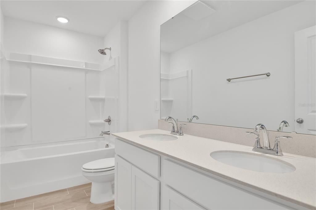 Bathroom, Dual Sink Vanities, Interior, Recessed Lighting, Wood Texture Flooring