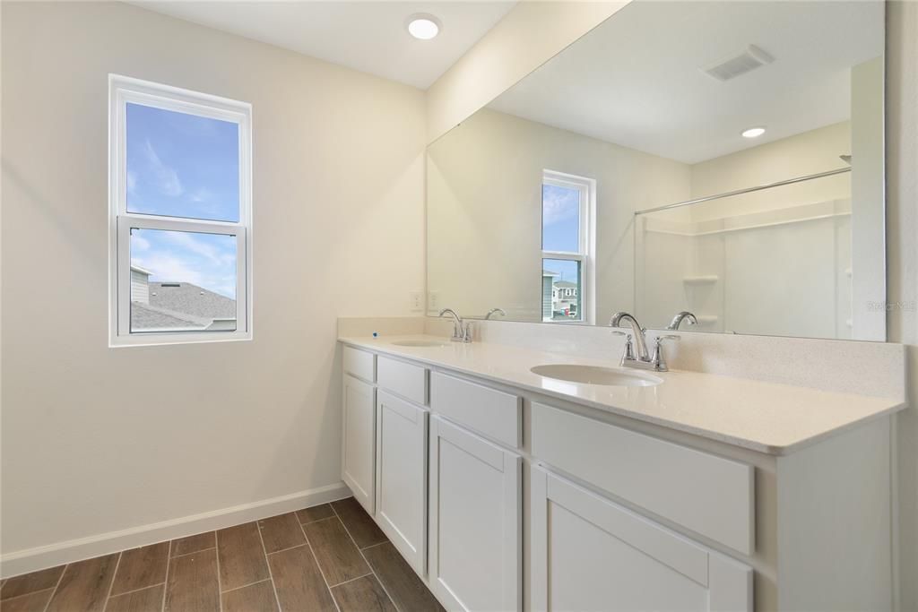 Bathroom, Dual Sink Vanities, Interior, Recessed Lighting, Wood Texture Flooring