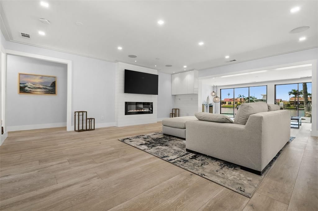 Fireplace, Interior, Living room, Recessed Lighting, Wood Texture Flooring