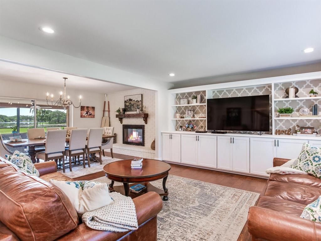Chandelier, Dining room, Fireplace, Interior, Living room, Recessed Lighting, Wood Texture Flooring