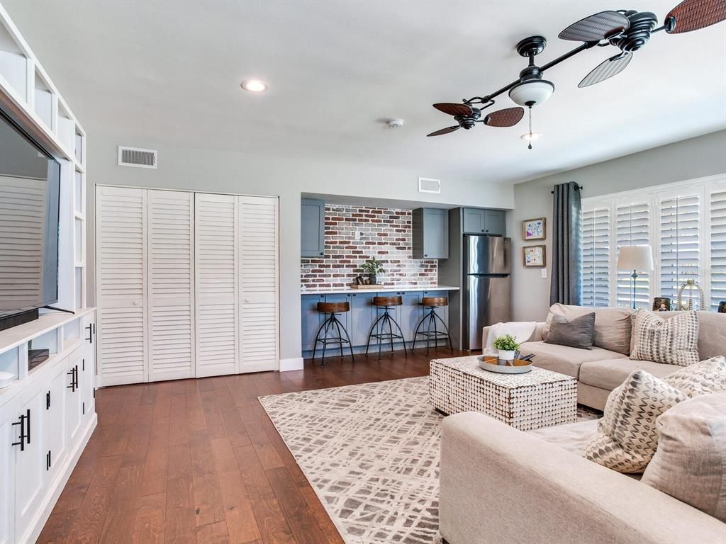 Interior, Kitchen, Living room, Recessed Lighting, Stainless Steel Appliances, Stone Walls, Wood Texture Flooring