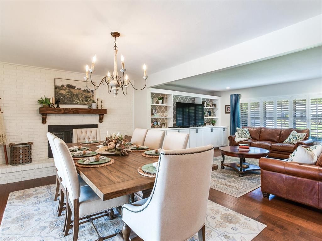 Chandelier, Dining room, Fireplace, Interior, Living room, Recessed Lighting, Stone Walls, Wood Texture Flooring