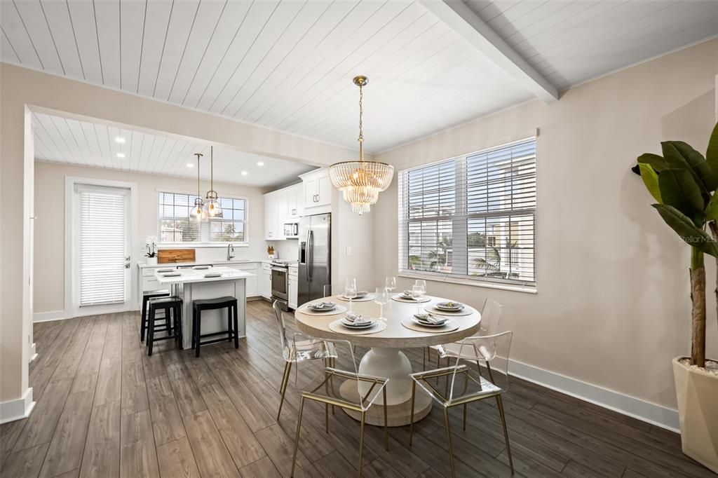 Chandelier, Dining room, Interior, Kitchen, Pendant Lights, Recessed Lighting, Stainless Steel Appliances, Wood Texture Flooring