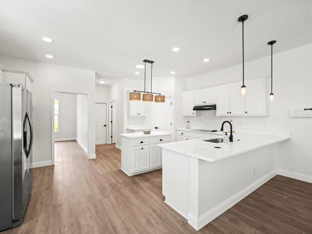 Interior, Kitchen, Pendant Lights, Recessed Lighting, Stainless Steel Appliances, Wood Texture Flooring