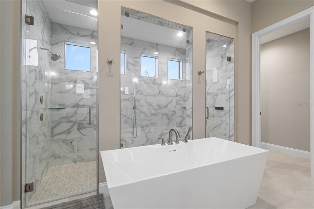 Bathroom, Free Standing Baths, Glass Shower, Interior, Marble Walls, Recessed Lighting