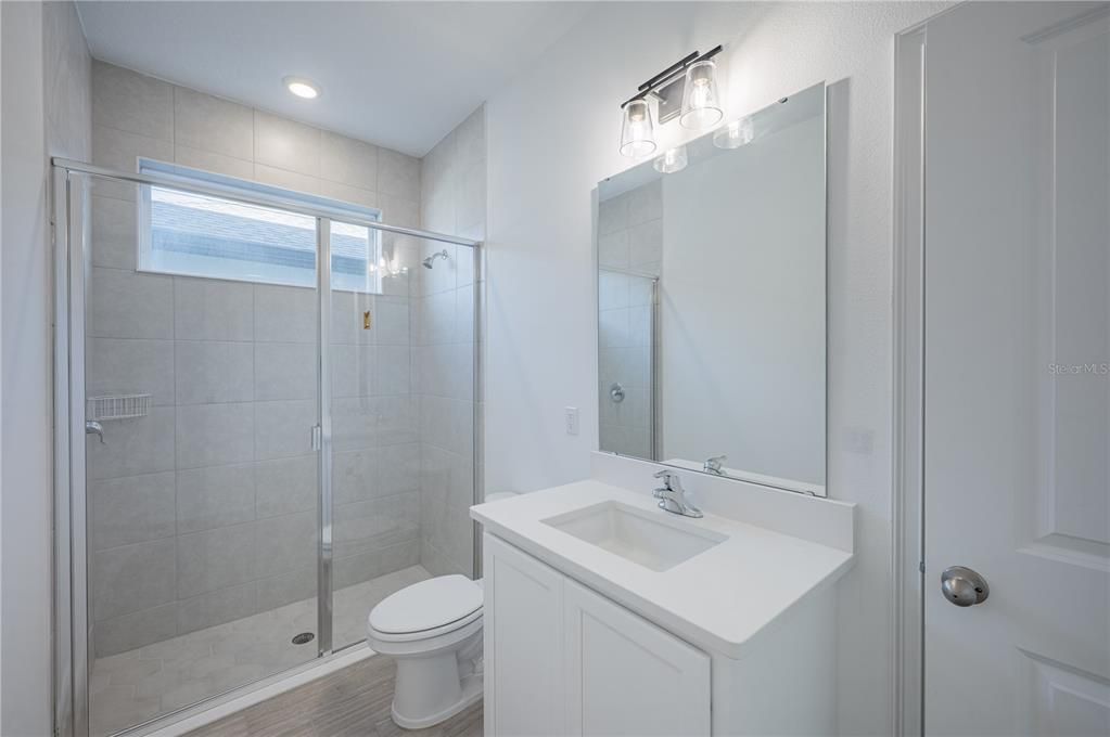 Bathroom, Glass Shower, Interior, Recessed Lighting, Wood Texture Flooring
