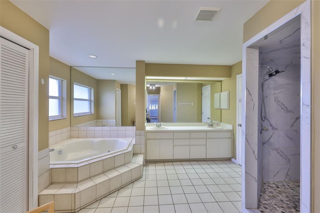 Bathroom, Dual Sink Vanities, Interior, Marble Walls, Recessed Lighting