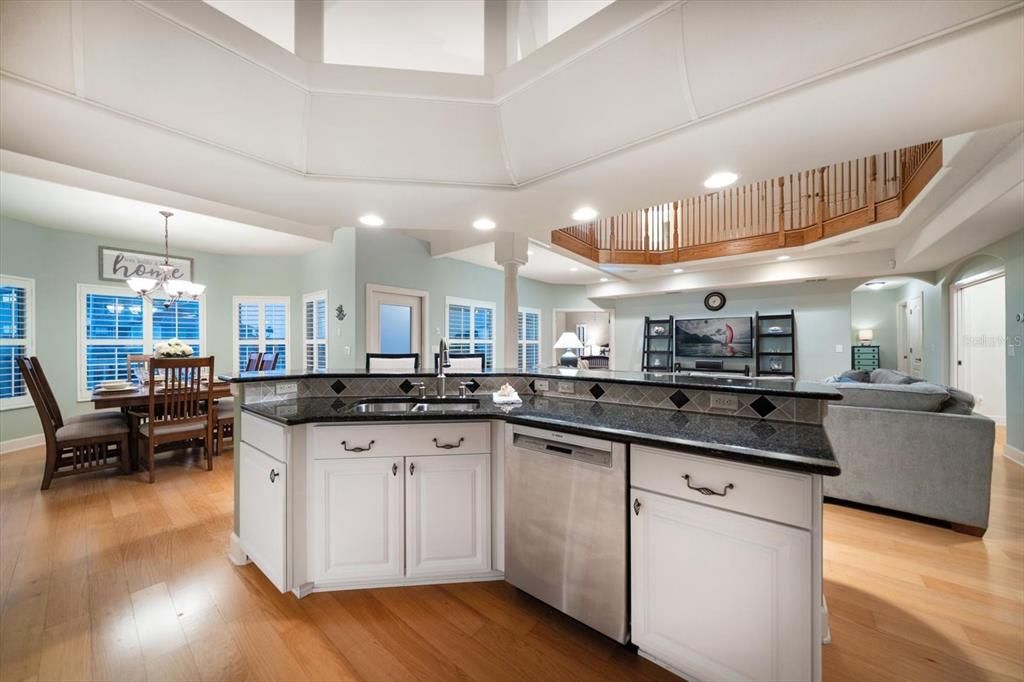 Chandelier, Dining room, Interior, Kitchen, Living room, Pendant Lights, Recessed Lighting, Wood Texture Flooring