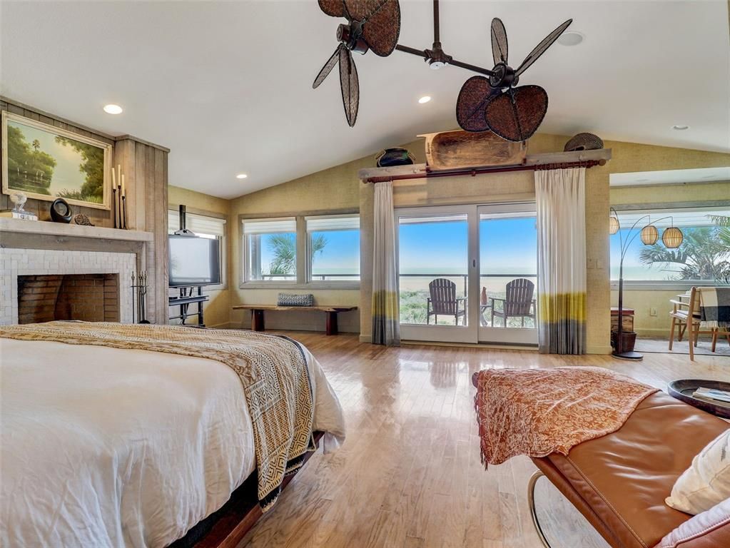 Bedroom, Fireplace, Interior, Recessed Lighting, Water, Wood Texture Flooring