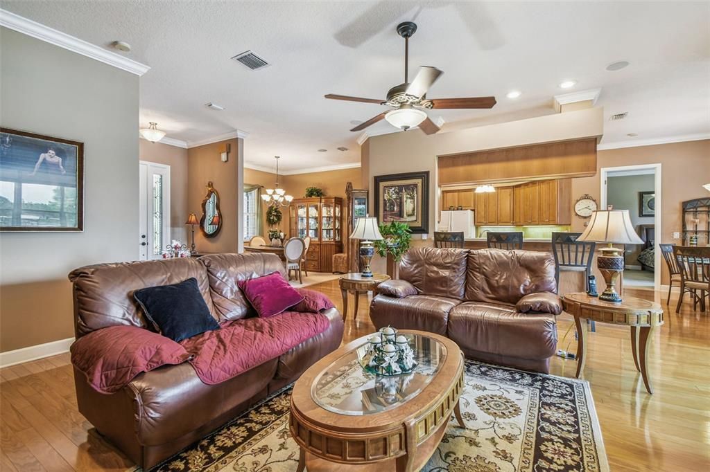 Chandelier, Dining room, Interior, Kitchen, Living room, Recessed Lighting, Wood Texture Flooring