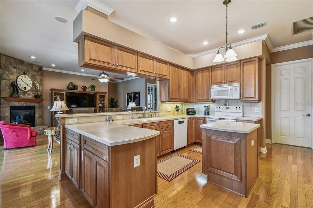 Fireplace, Interior, Kitchen, Pendant Lights, Recessed Lighting, Stone Walls, Wood Texture Flooring