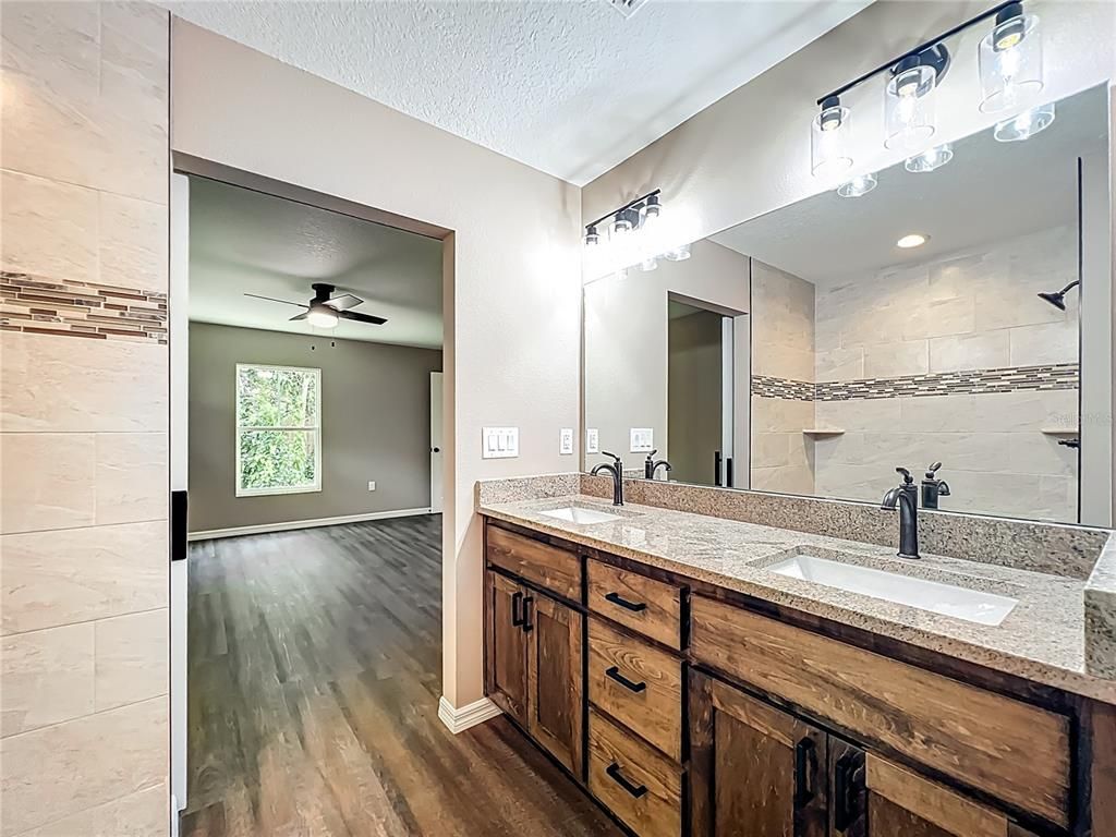 Bathroom, Dual Sink Vanities, Interior, Recessed Lighting, Wood Texture Flooring