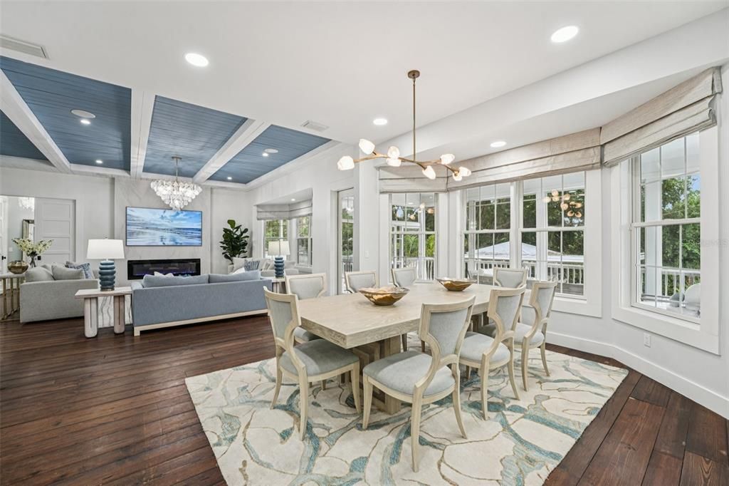 Chandelier, Dining room, Fireplace, Interior, Living room, Pendant Lights, Recessed Lighting, Wooden Ceilings, Wood Texture Flooring