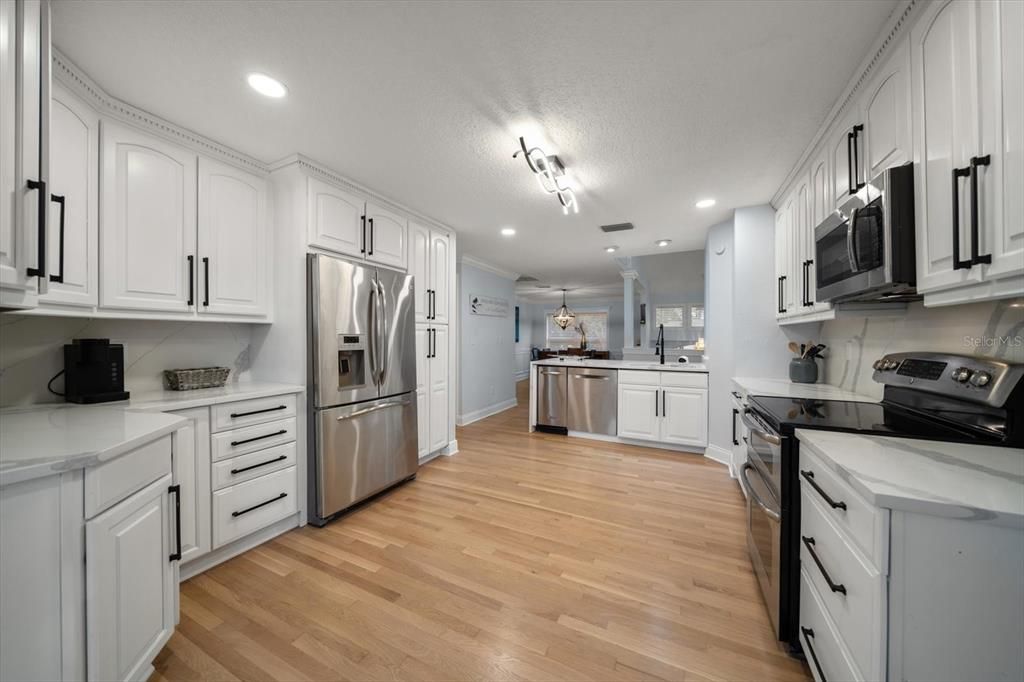 Interior, Kitchen, Recessed Lighting, Stainless Steel Appliances, Wood Texture Flooring