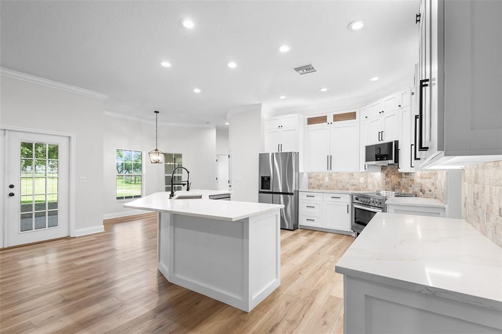 Interior, Kitchen, Pendant Lights, Recessed Lighting, Stainless Steel Appliances, Wood Texture Flooring