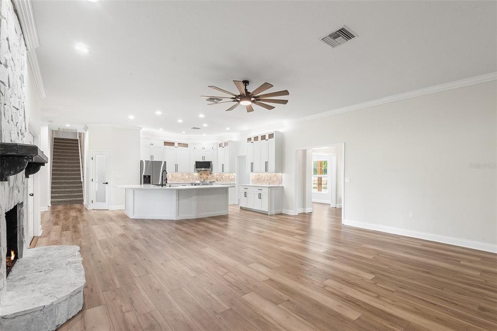 Fireplace, Interior, Kitchen, Recessed Lighting, Wood Texture Flooring