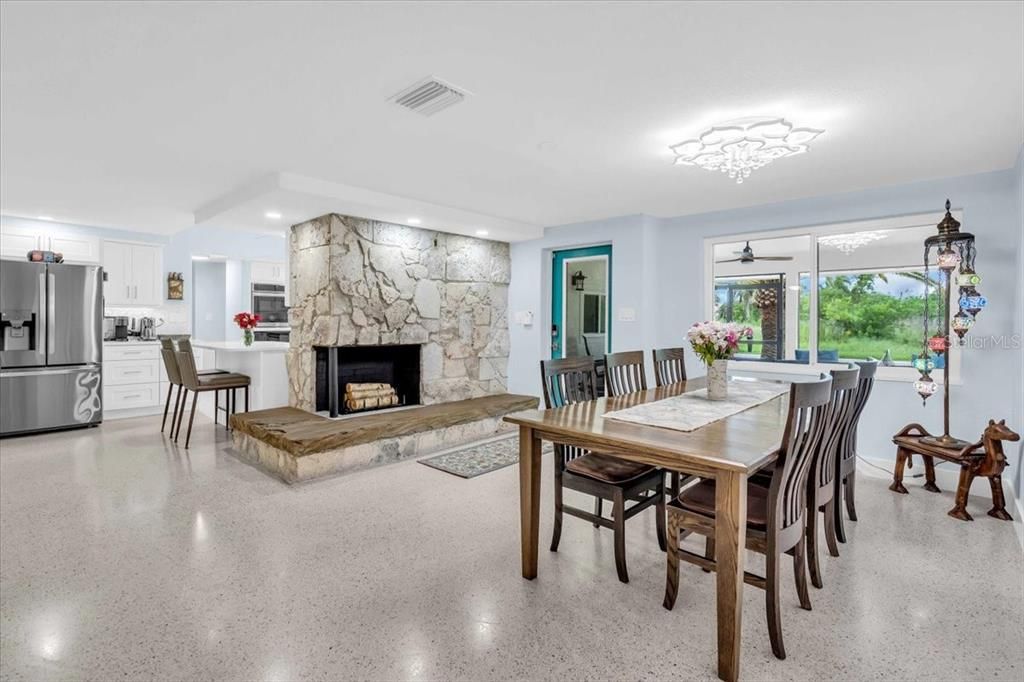 Dining room, Fireplace, Interior, Kitchen, Recessed Lighting, Stainless Steel Appliances, Stone Walls