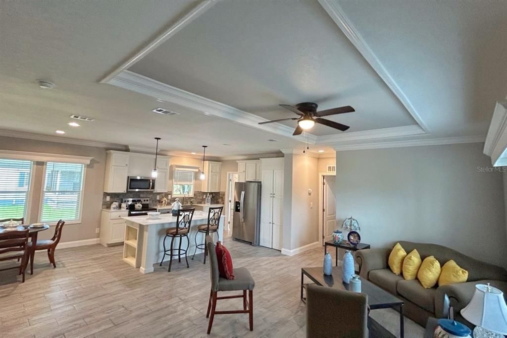 Dining room, Interior, Kitchen, Pendant Lights, Recessed Lighting, Stainless Steel Appliances, Wood Texture Flooring