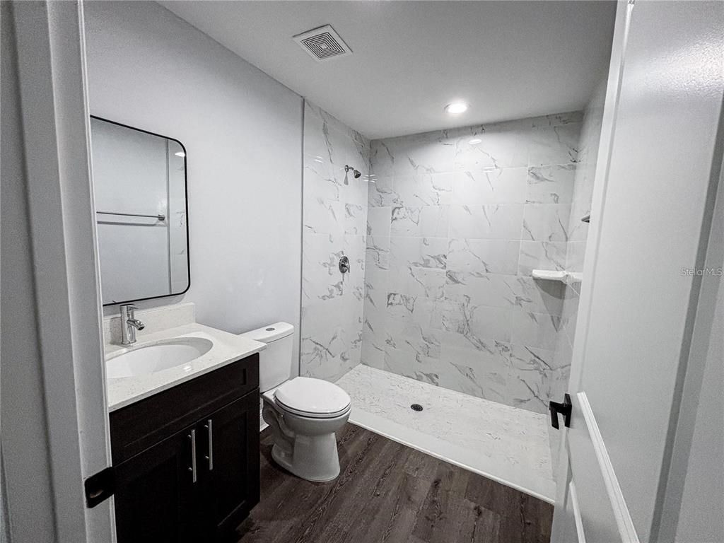Bathroom, Interior, Marble Walls, Recessed Lighting, Wood Texture Flooring