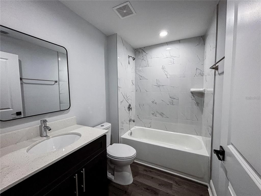 Bathroom, Interior, Marble Walls, Recessed Lighting, Wood Texture Flooring
