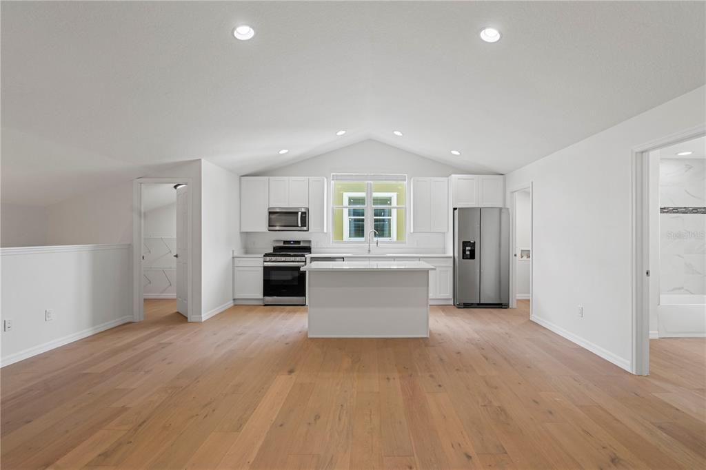 Interior, Kitchen, Recessed Lighting, Stainless Steel Appliances, Wood Texture Flooring
